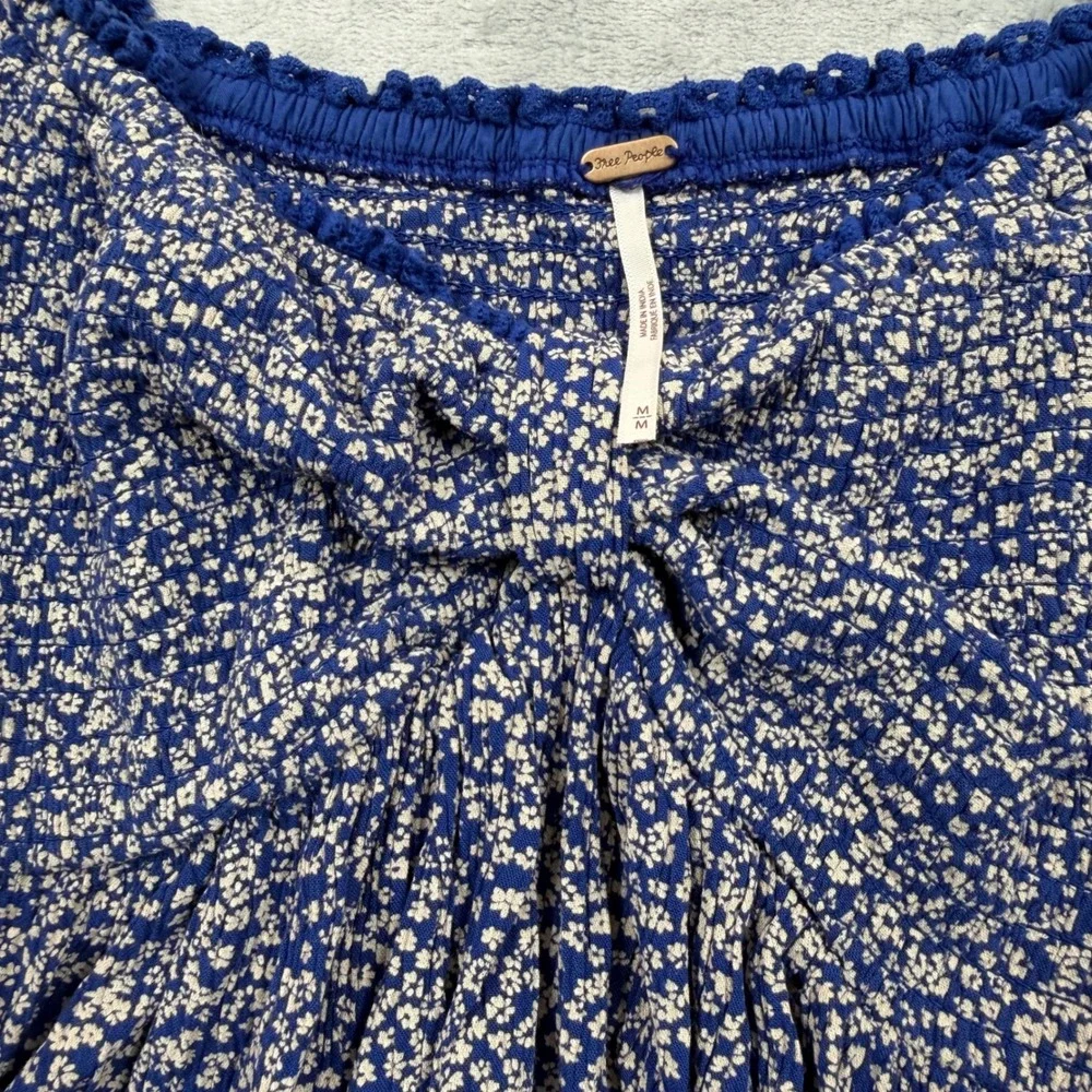 Free People Top Womens M Blue Floral Smocked Puff Sleeve Peplum Blouse